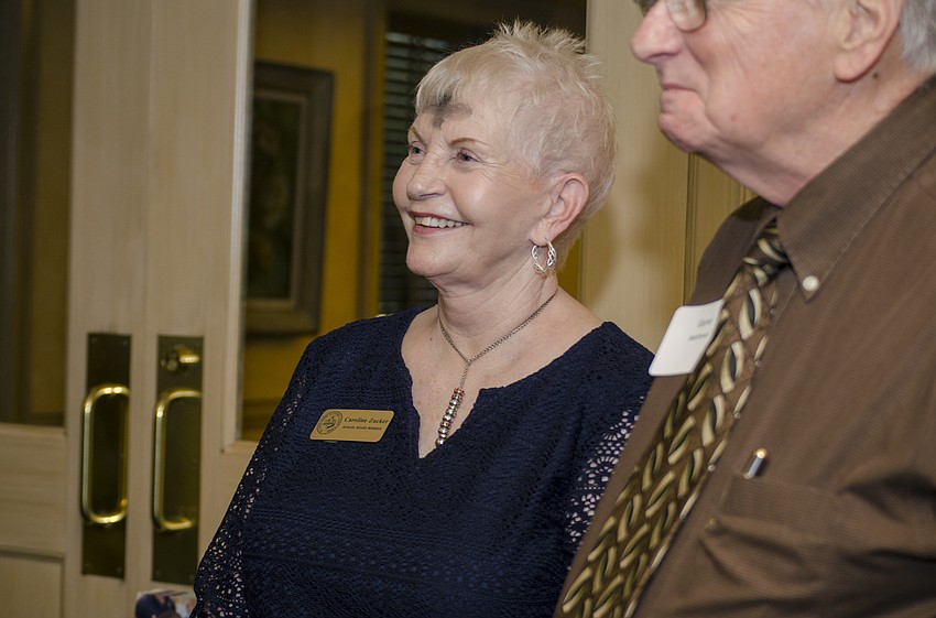 Sarasota County School Board Chairwoman Caroline Zucker laughs during Superintendent Bowden'       s address.
