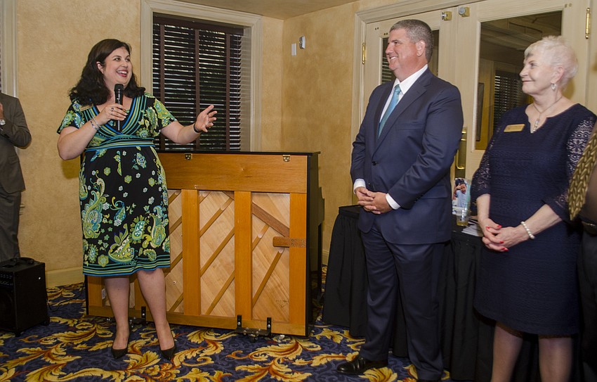 Argus Foundation Executive Director Christine Robinson welcomes Superintendent Todd Bowden.