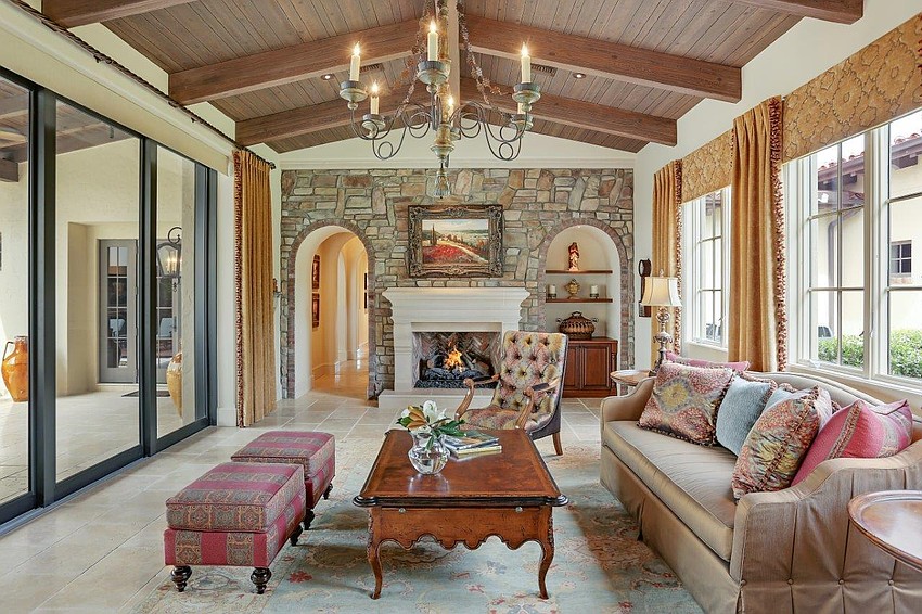 An extraordinary fireplace lights up the room.