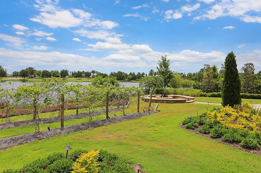 If you can afford the home, you can afford a gardener to take care of the lush vines and bushes.