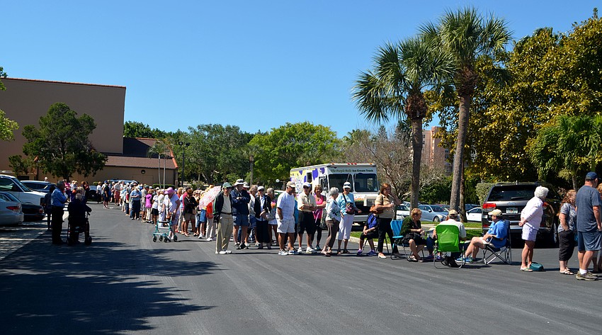 The line to get into the early bird sale went from the church to its parish hall.