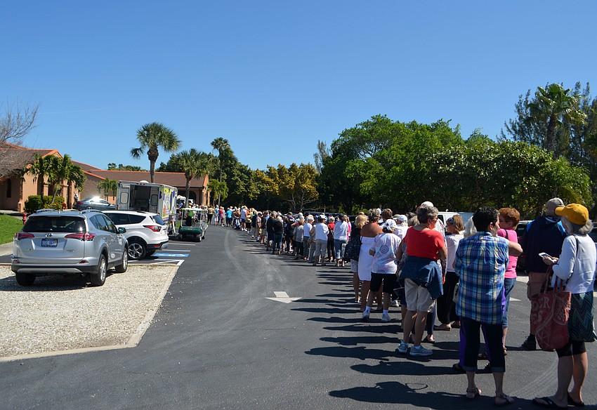 The line to get into the early bird sale went from the church to its parish hall.