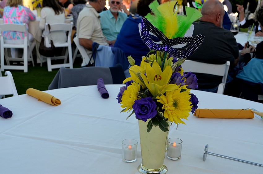 The centerpieces matched the Mardi Gras theme.