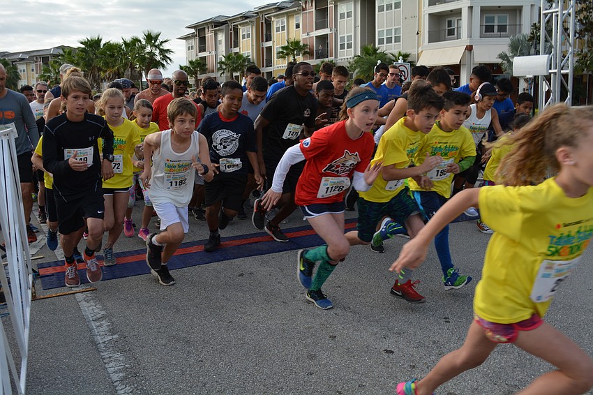 They are off and running in the Take Stock in Children 5K.