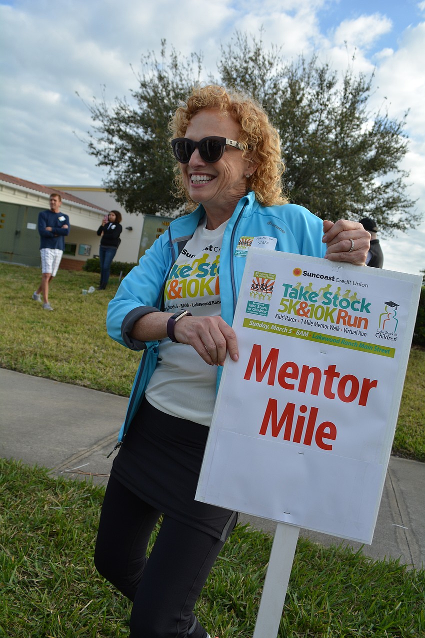 Anne Heller, a Take Stock board member, readies for the mentor'  s one-mile walk.