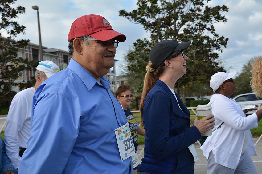East County resident and Manatee County School Board member John Colon walks in the one-mile mentor walk.