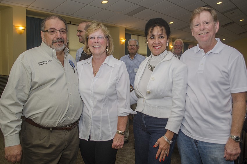County Commissioner Alan Maio, Nancy Maio, Esther Quiles and Siesta Key Chamber of Commerce Chairman Mark Smith