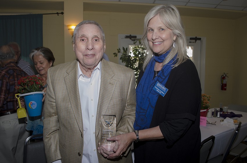 SKA Vice President Catherine Luckner poses with Deet Jonker. Jonker was honored for his service on the SKA including his tenure as membership chairman.