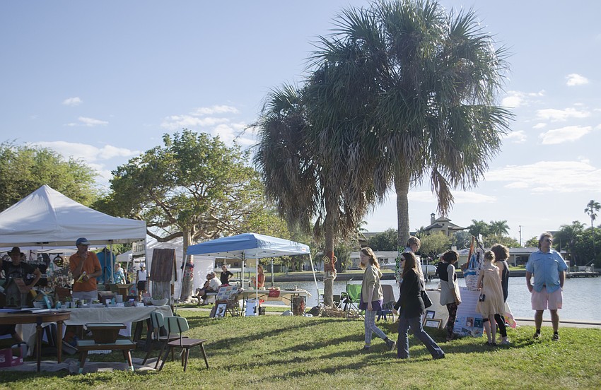 Neighbors and visitors browsed work from local and regional artists.