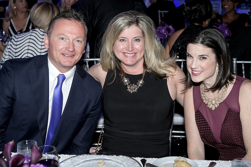 Clint and Heather Kasten with Veronica Kuehn