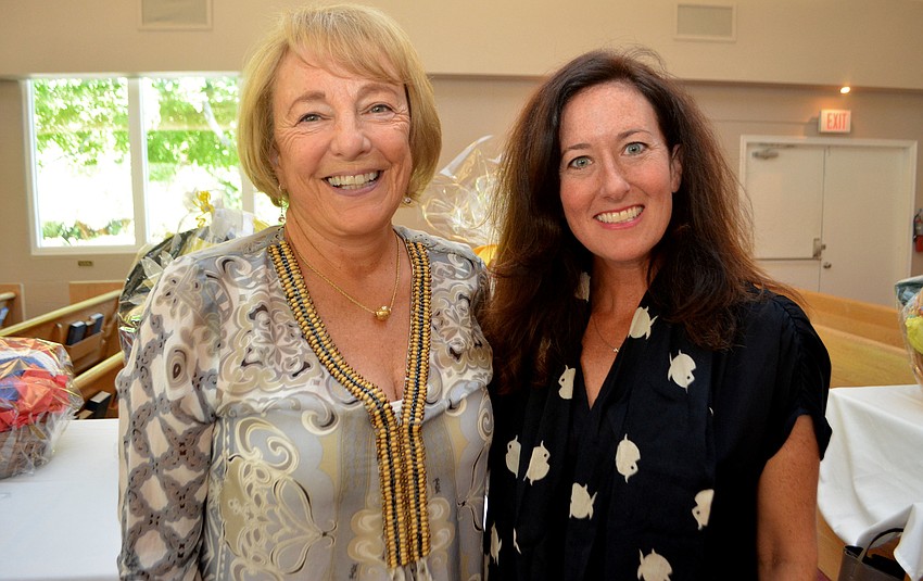 Fashion show co-chairwoman Donna Dolan and Kim Marsella