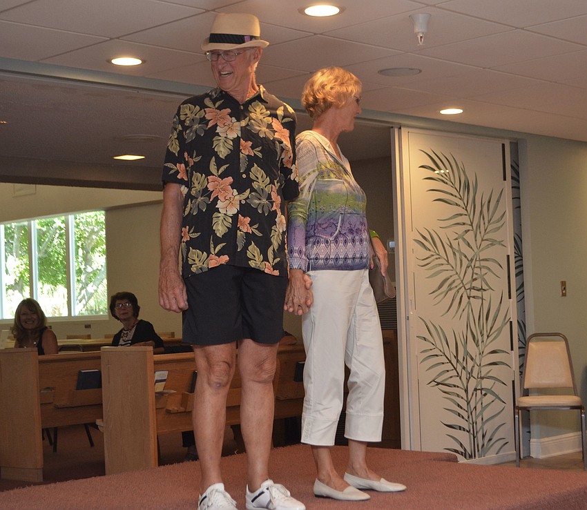 Warren and Duane Guse model clothes during the “Daytime Delight” portion of the fashion show.