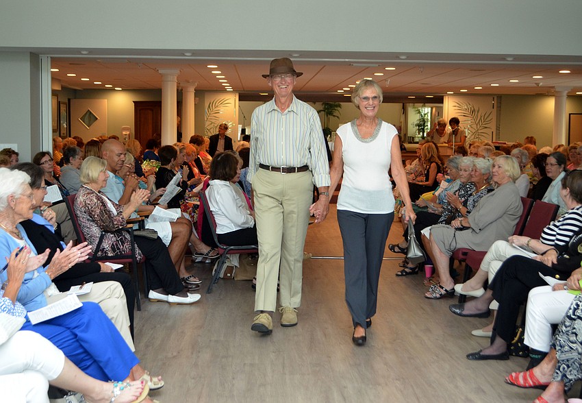 Warren and Diane Guse work the runway during the “Florida Fun” portion of the fashion show.