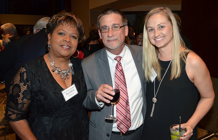 Aundria Castleberry, Rev. Bruce Wismer and his daughter, Lindsay Wismer