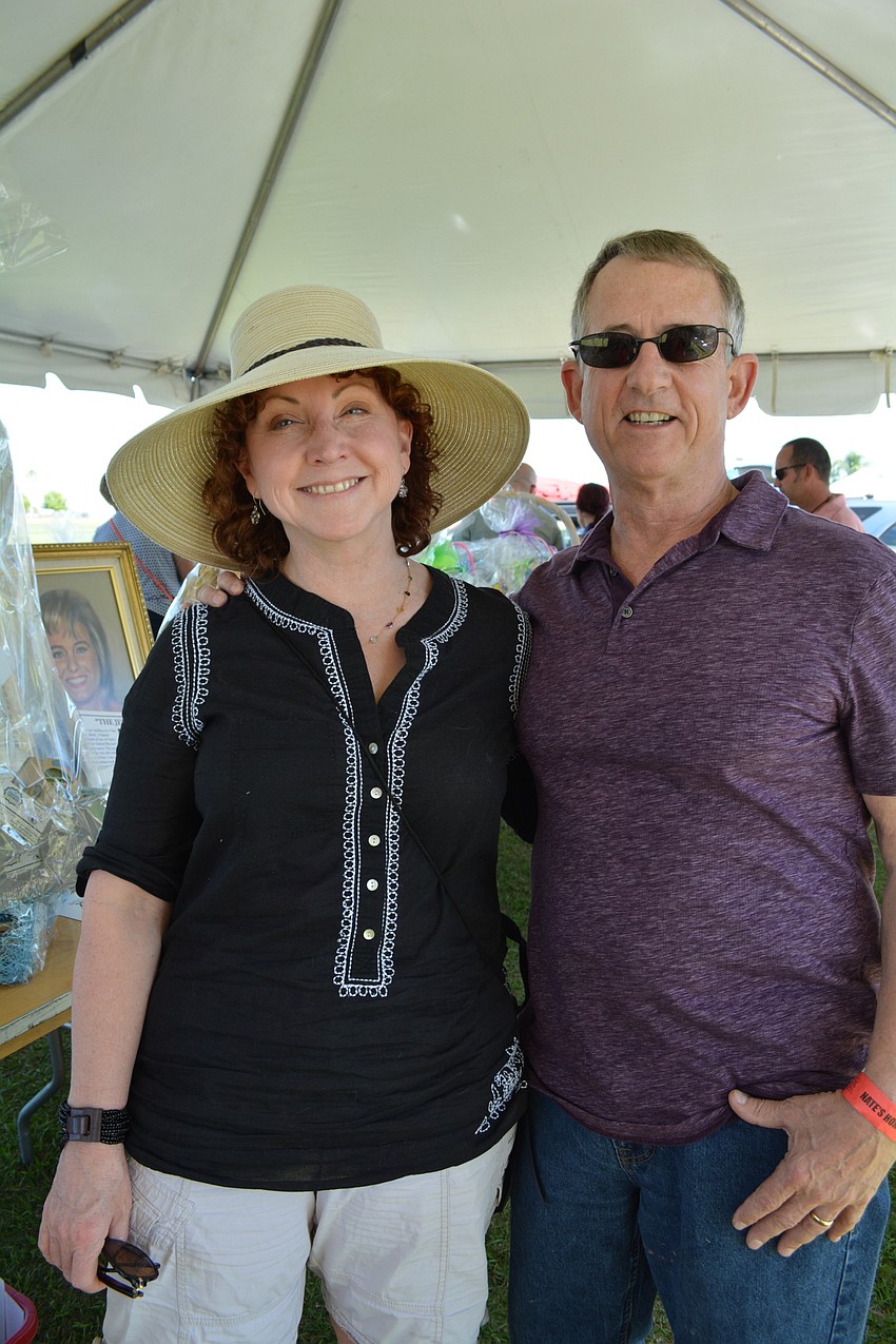 Lisa and Mike Evans, of Sarasota, got their two cats from Nate'    s Honor Animal Rescue.