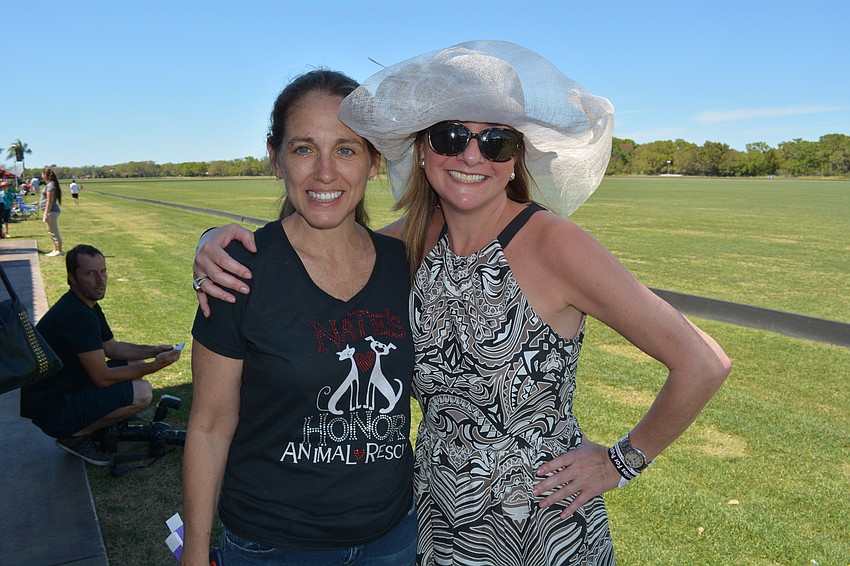 Nate'    s Honor Animal Rescue Executive Director Dari Oglesby greets event chairwoman Jessica Ortiz.