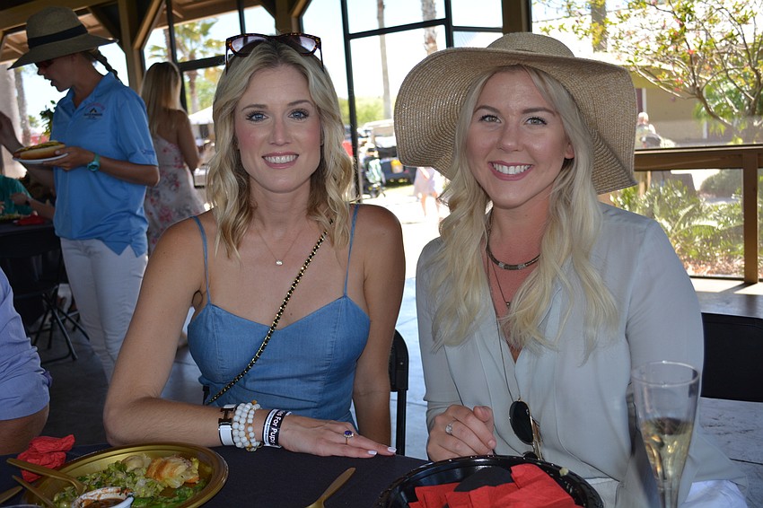 Sara Ferguson and Taylor Karp enjoy a catered lunch in the pavilion.