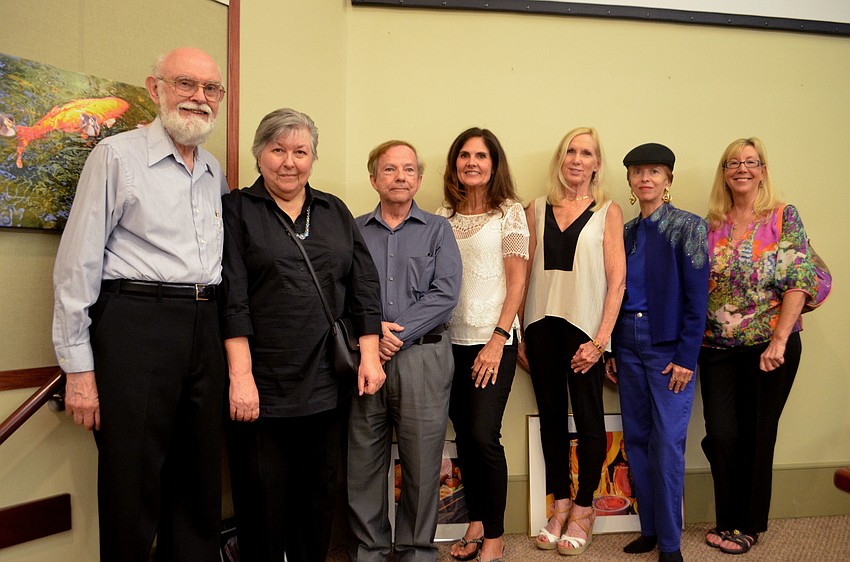 Artists Roger and Mariarosa Rockefeller, Bob Parrish, Mary Lou Johnson, Barbara Jendrysik, Renee DiNapoli and JoAnne Curtain. Photography by Ron Johnson, who died in June, was on display.