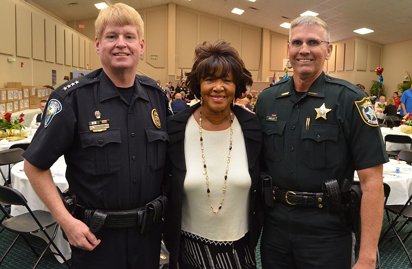Palmetto Chief of Police Scott Tyler, event organizer Shirley Pearson and Manatee County Sheriff Rick Wells