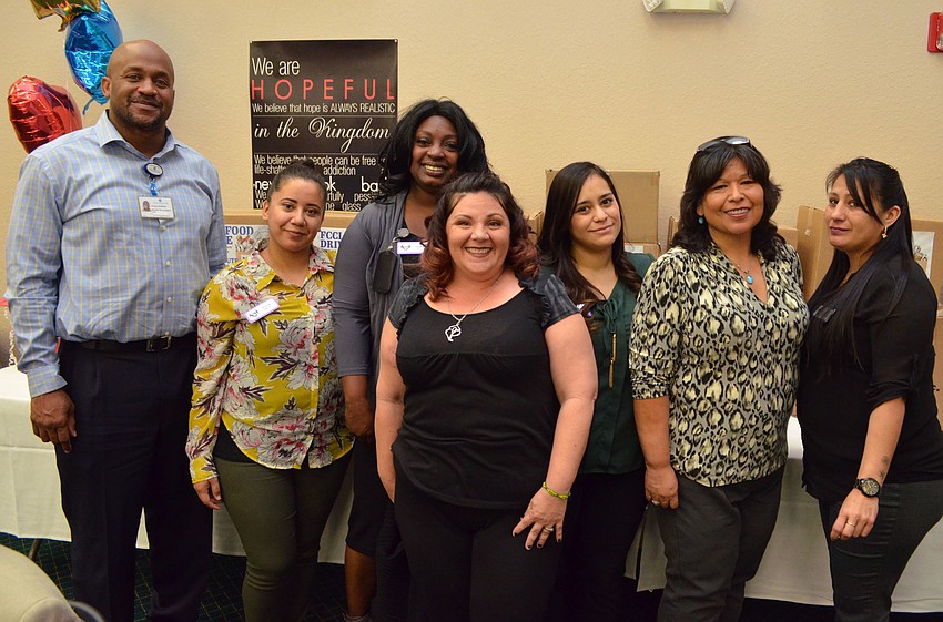 Charles Whitfield, Leticia Veliz, Uganda Harris, Lucy Dela Cruz, Margarita Velasquez, Livia Leyva and Dora Amaro