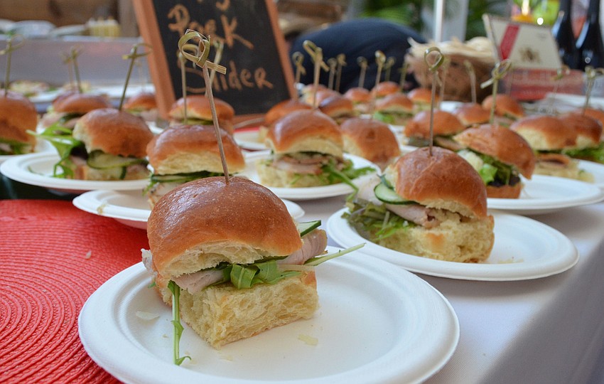 Beach House employees served mojo pork sliders at Party on the Pass: “Hot Night in Old Havana” on March 24 at Mote Marine Laboratory & Aquarium.