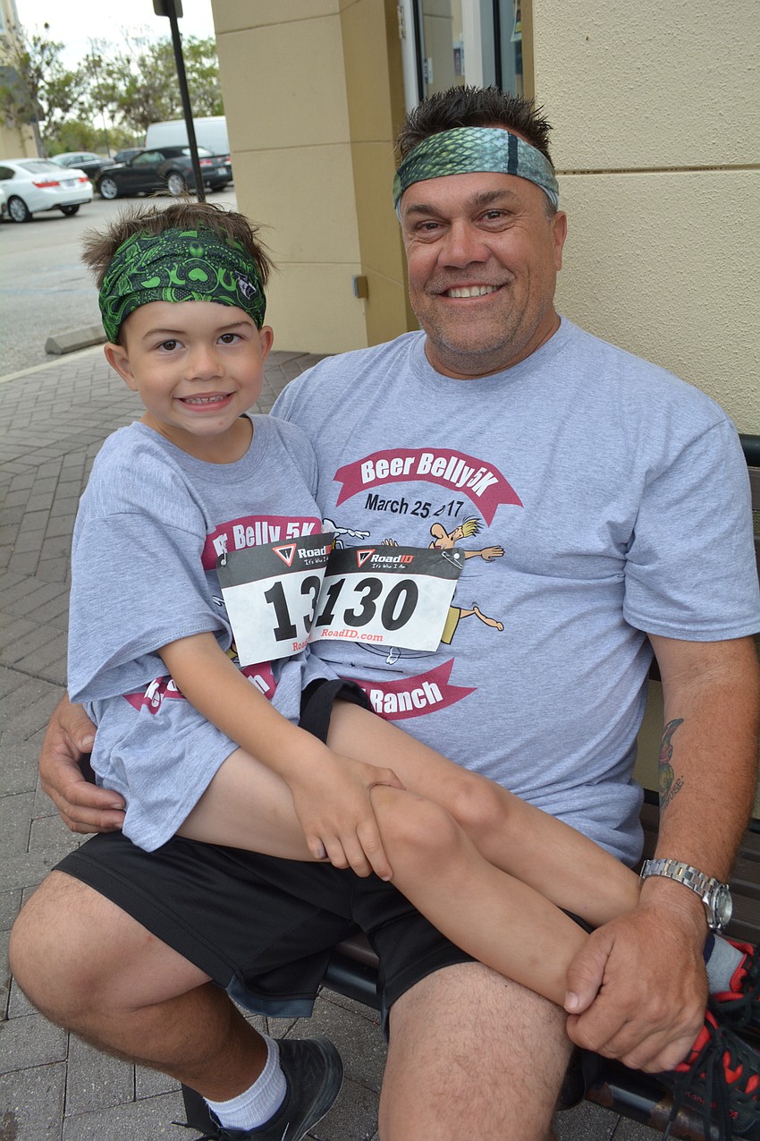 Tyler and Richard Padgett, of Parrish, kick of a healthy-living campaign with the run.