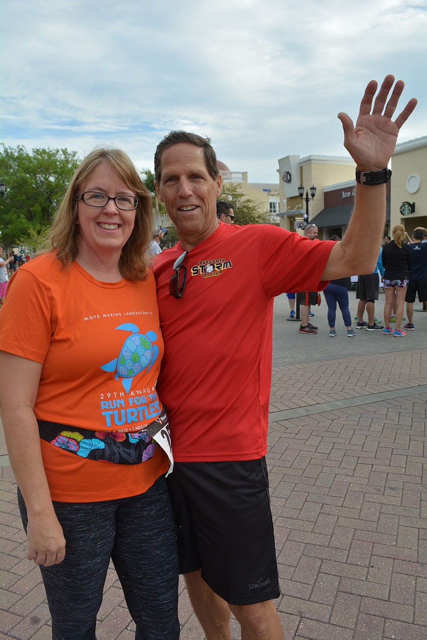Carol Binion and Danny Smith, of Sarasota, run for the exercise and the cause.