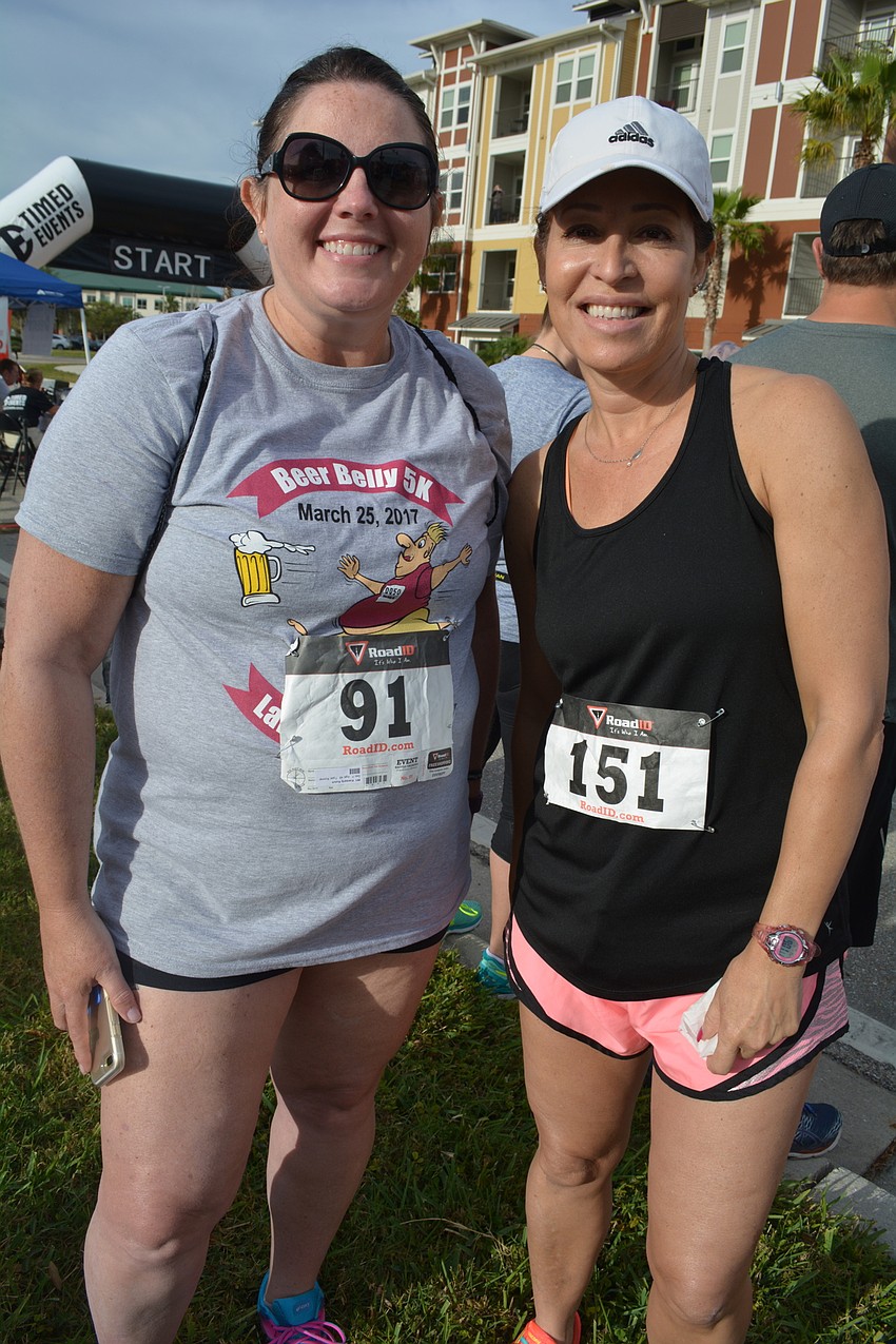 Kim Kutch, of Ellenton, and Susan Rivera, of Lakewood Ranch, try a morning of running for beer, rather than their typical wine tastings they attend together.