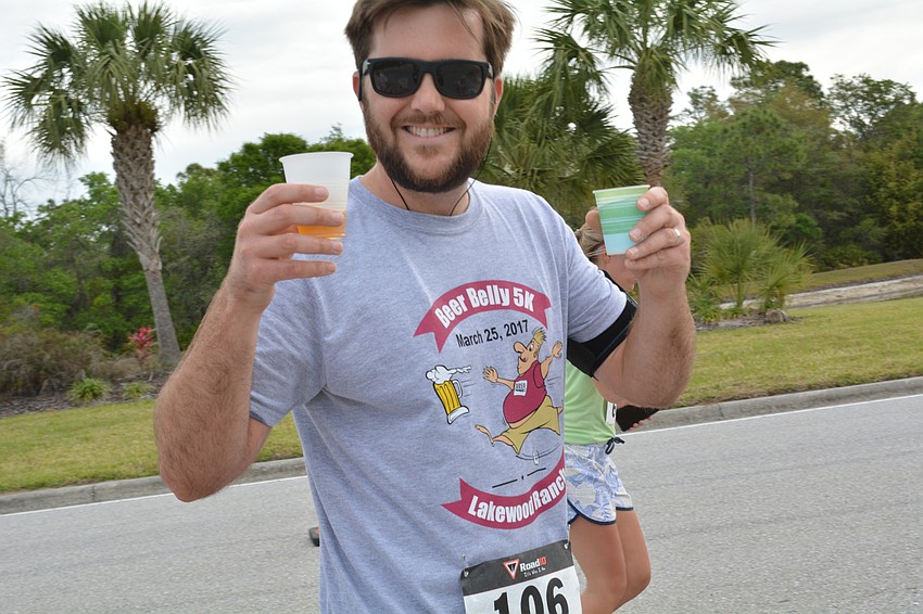Justin McDonald grabbed beer and Gatorade at the halfway point.