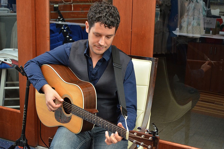 Jason Hobert performs for guests during cocktail hour at Miracle Ball on March 25 at Sarasota Yacht Club.