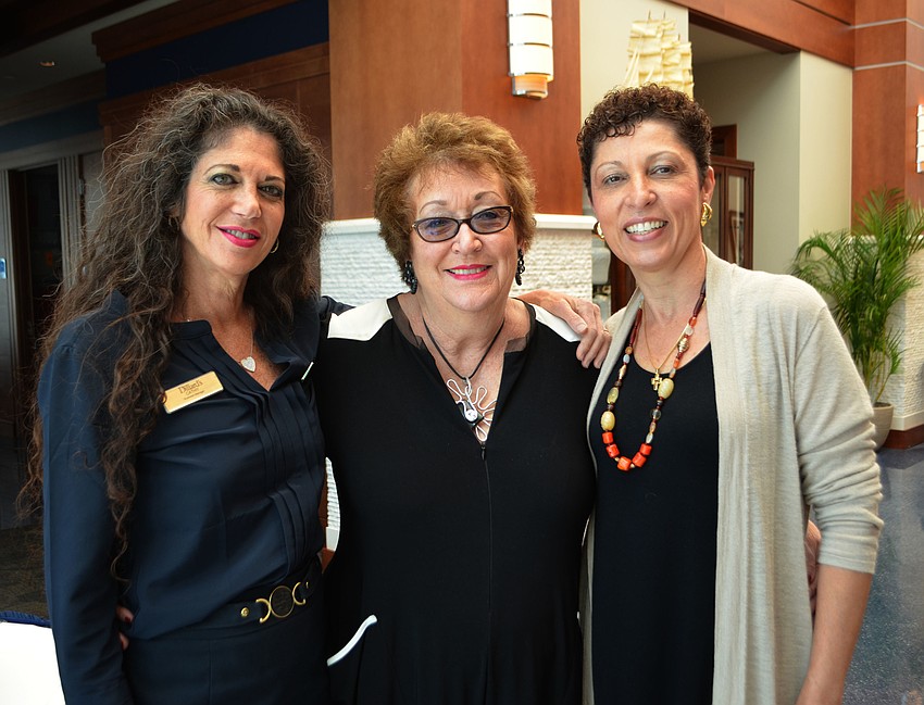 Cathy Brand of Estee Lauder and Debbie Palmer and Violeta Mautner of Dillard’s