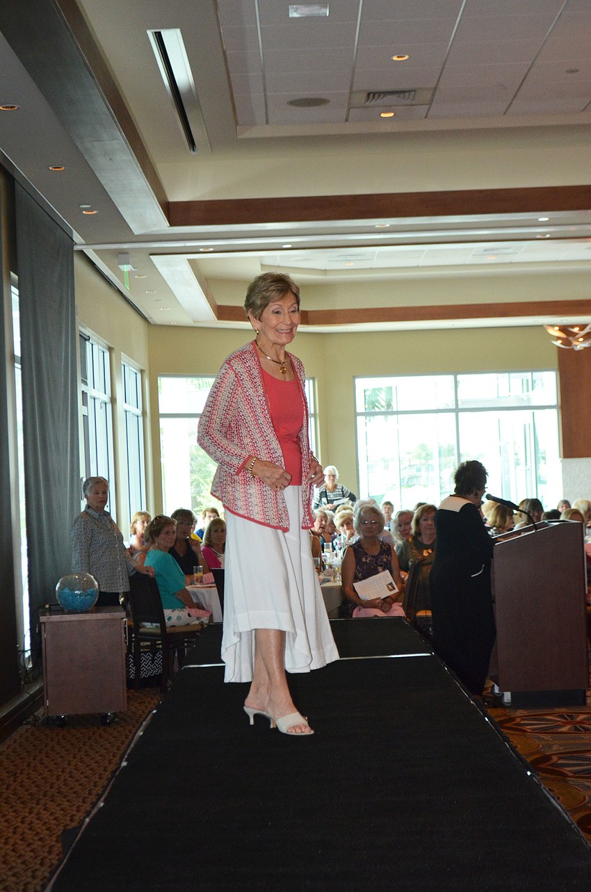 Jane Vorel is all smiles as she takes the runway during the “Chantilly Lace” Fashion Show.