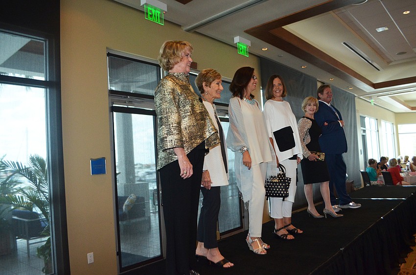 The models walk the runway a final time on March 27. The annual fashion show took place at the Sarasota Yacht Club.