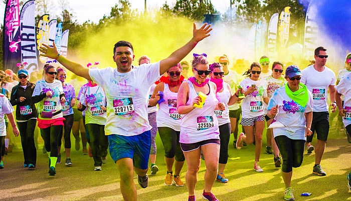 Participants get sprayed with colored chalk throughout the run. Courtesy image.