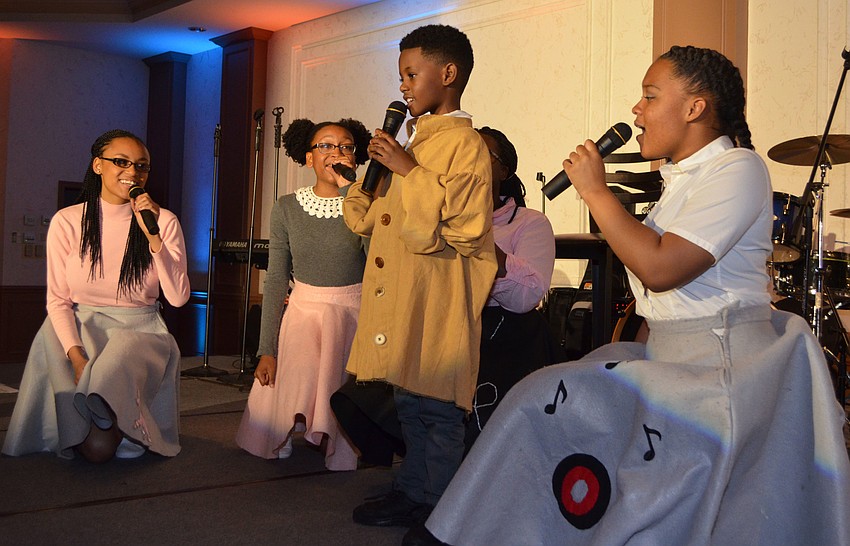 Participants from the Stage of Discovery camp perform “Walking Down Fairytale Lane” at April Fools’ Fete on March 30 at Michael’s On East.