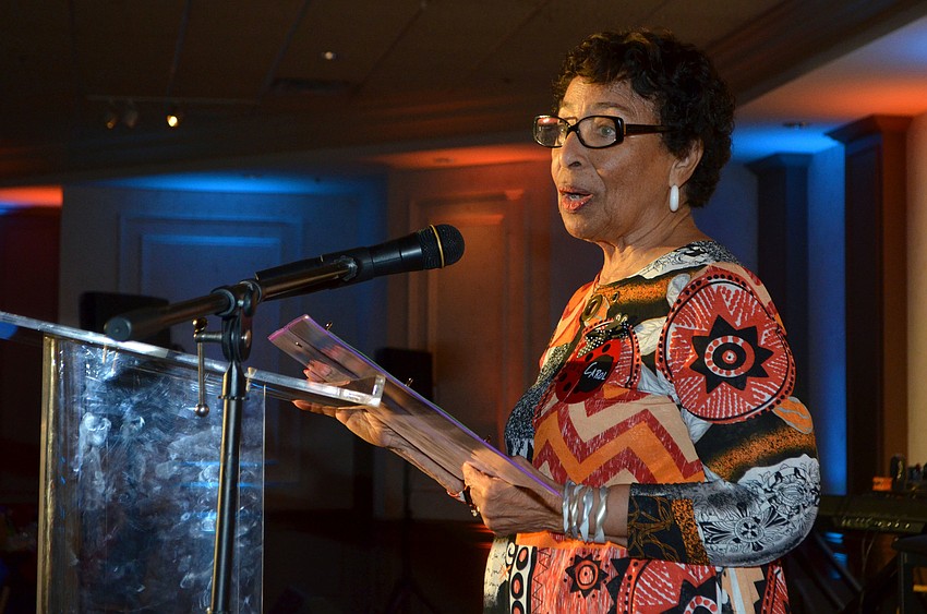 Co-Chairwoman Carol Poteat-Buchanan welcomes the crowd at April Fools’ Fete on March 30 at Michael’s On East.