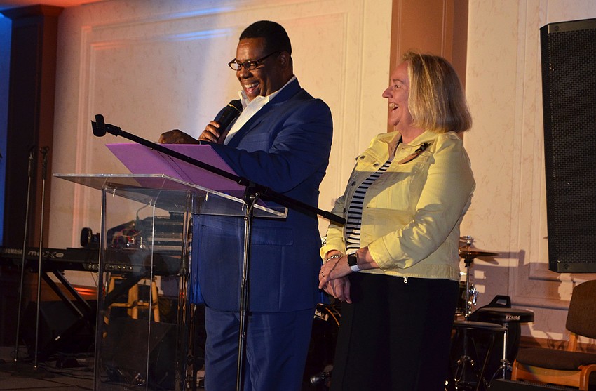 WBTT Founder/Artistic Director Nate Jacobs laughs with WBTT Executive Director Julie Leach when introducing the performers at April Fools’ Fete on March 30 at Michael’s On East.