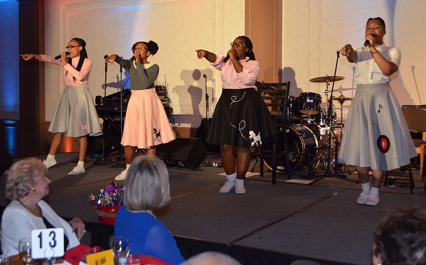 Participants from the Stage of Discovery camp perform “Walking Down Fairytale Lane” at April Fools’ Fete on March 30 at Michael’s On East.