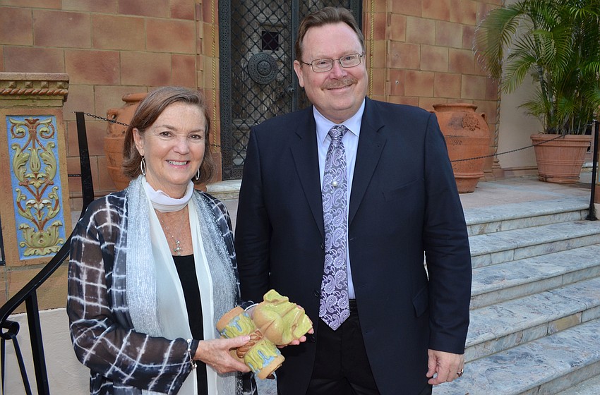 Chief Conservator of Ca’ d’Zan Barbara Ramsay and Curator of Ca' d' Zan Ron McCarty showed guests scraps of terra cotta that have fallen off the mansion’s exterior