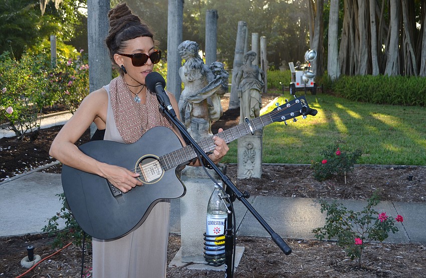 Jun Bustamante performs for guests at the 5th annual Wine Walk to Ca’ d’Zan on March 31 at The Ringling.