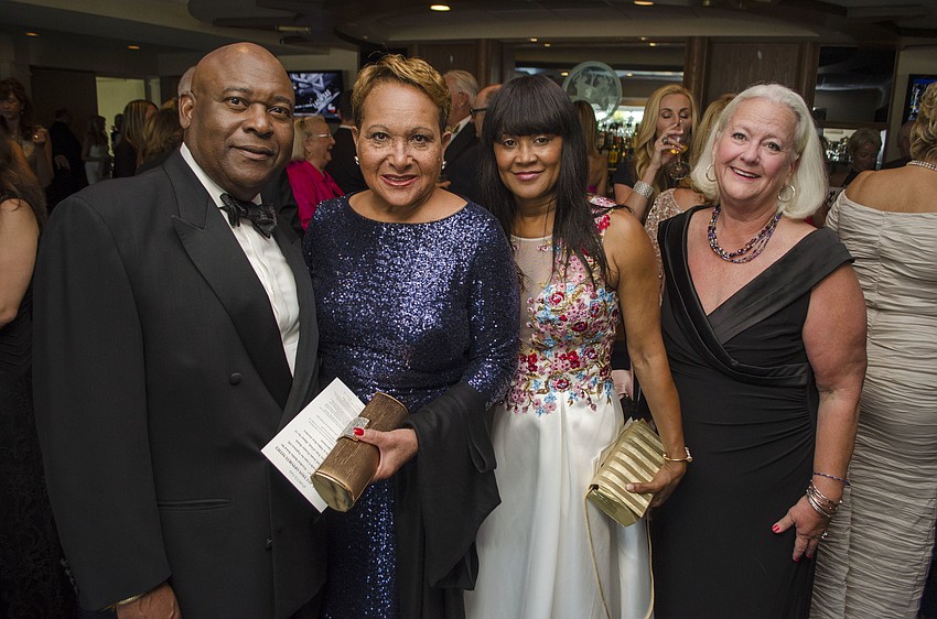 Jerry and Marjorie Long, Angela Regnier, and Safe Place and Rape Crisis Center Board of Directors Chairwoman Susan Erhart