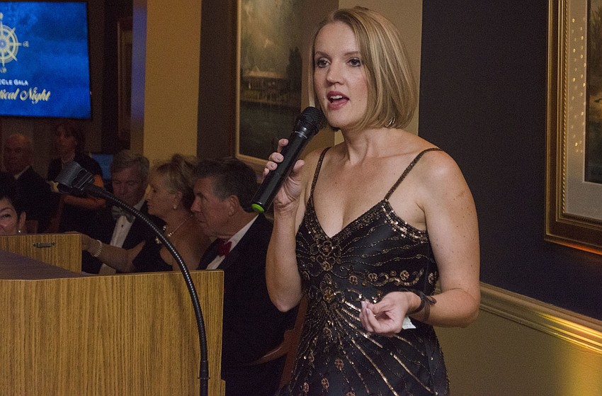 Safe Place and Rape Crisis Center President and CEO Jessica Hays explains SPARCC services to guests at SPARCCle Gala: “A Nautical Night” on April 8 at Bird Key Yacht Club.