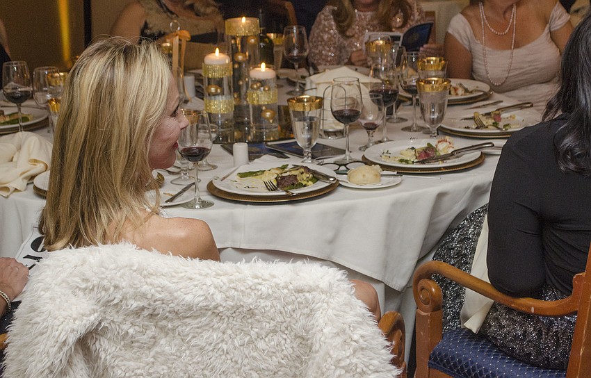 Sara McGregor waits to see if her bid is the winning bid during the live auction at SPARCCle Gala: “A Nautical Night” on April 8 at Bird Key Yacht Club.