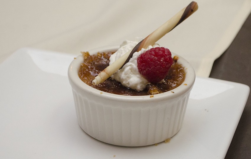 Guests enjoyed creme brulee with raspberry and whipped cream at SPARCCle Gala: “A Nautical Night” on April 8 at Bird Key Yacht Club.