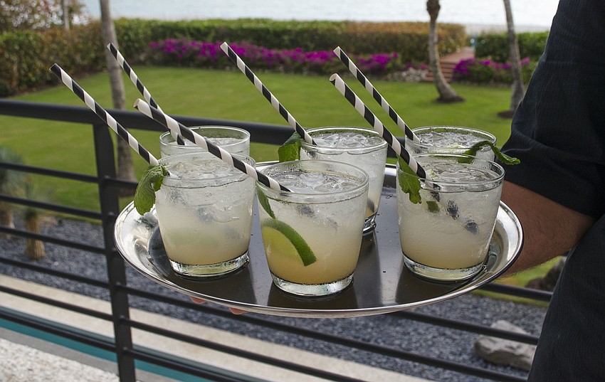 Guests at Starry Night Dinner 3 on April 17 at the home of Elaine and Bill Crouse enjoyed “Beatnix Collins,” a gin-based signature drink made with grapefruit juice, lemon juice, simple syrup, soda water and fresh mint.