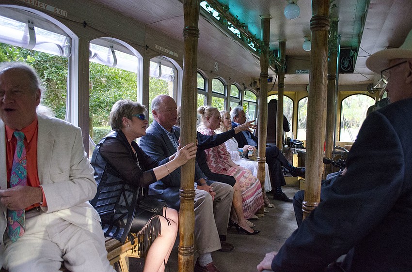 Guests at Starry Night Dinner 3 on April 17 at the home of Elaine and Bill Crouse parked near the Sanderling Club tennis courts and took a trolley to the event.