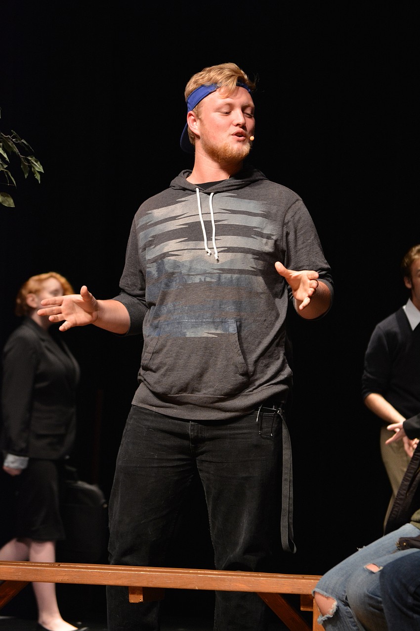 Harvard law student Emmett Forrest, played by Seth Palmer, welcomes a group of new students.