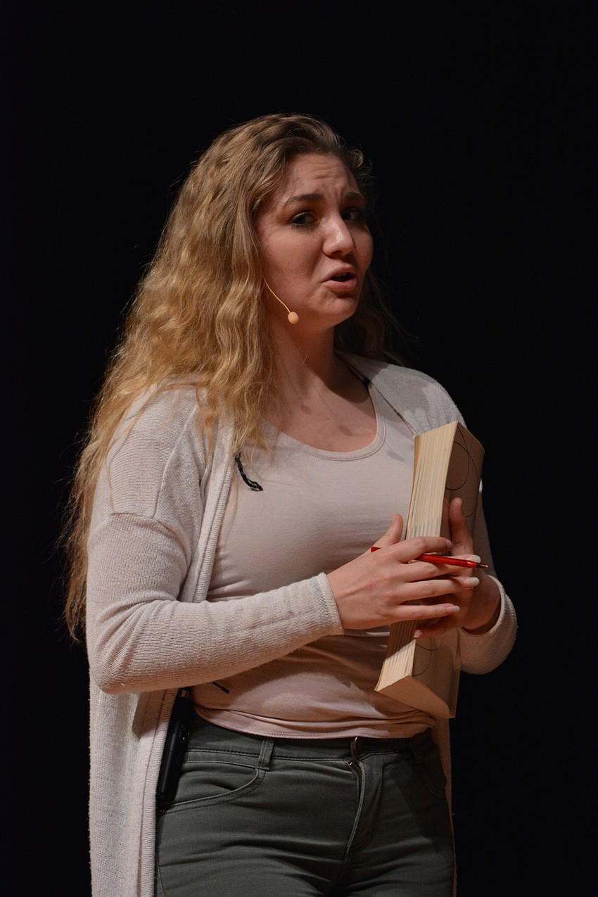 Megan Affolter, as Kate, the Delta Nu’s academic chair, comes up with the master plan to get Elle into Harvard Law.