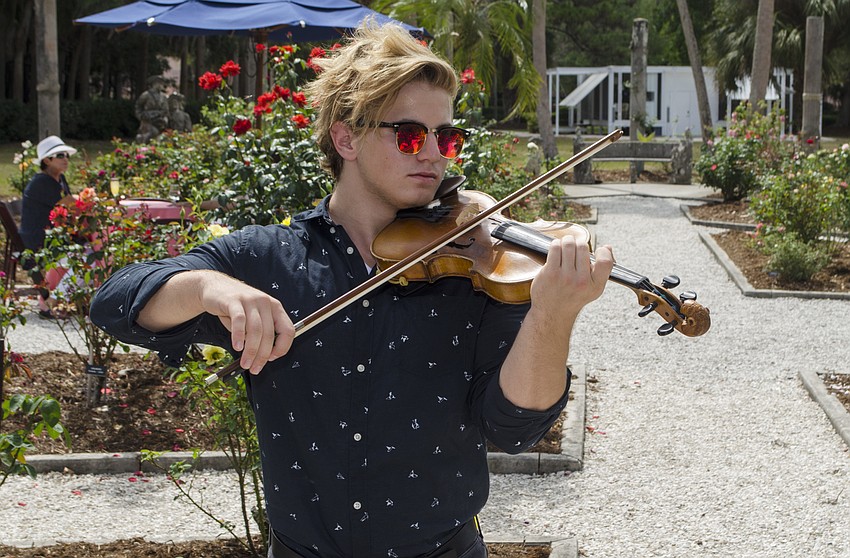 Paul Leonov performs for guests at Blossoms & Brunch on April 22 at The Ringling.