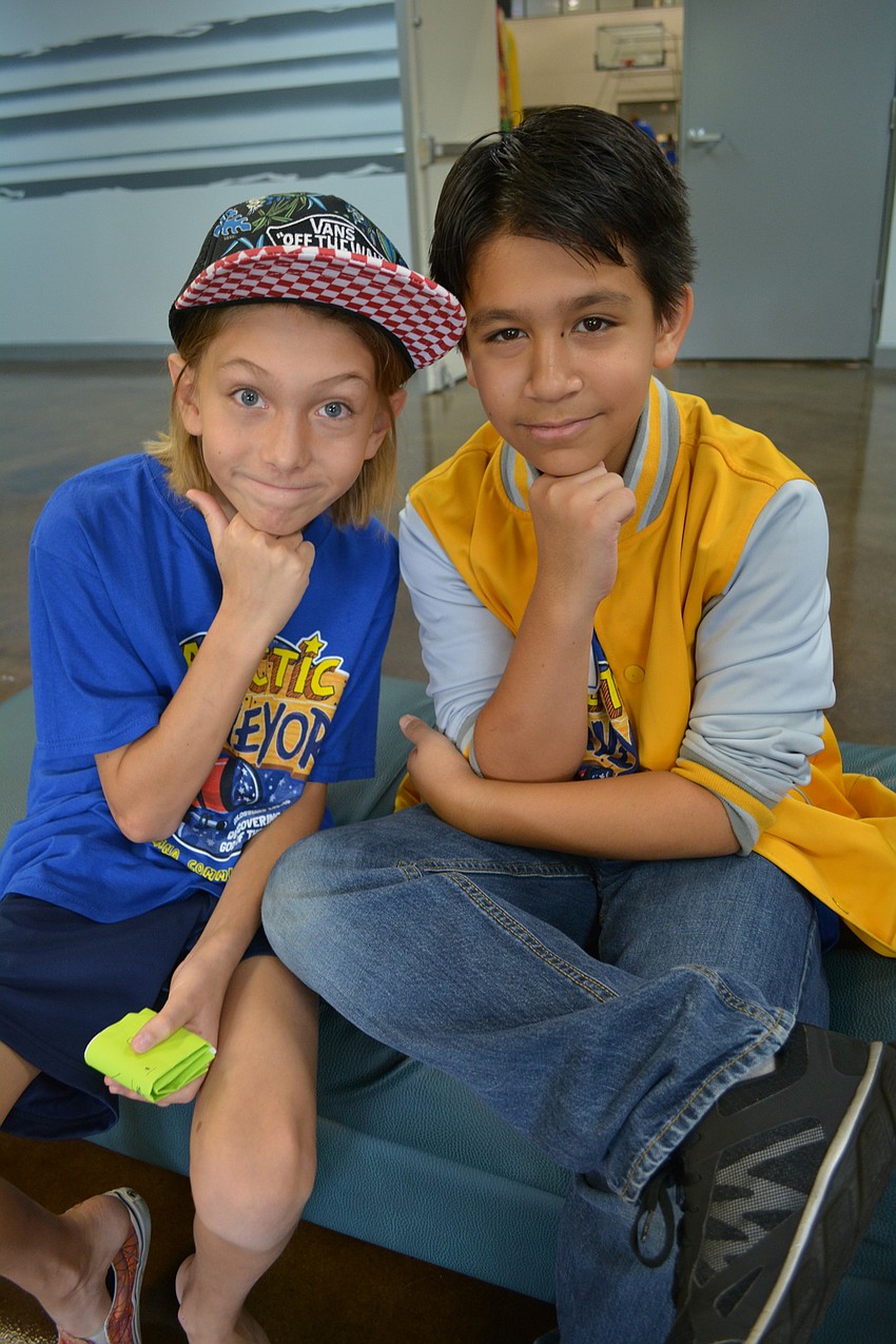 East County residents Tristan Bevan and Jacob Mazzone, both 10, love leading worship for Vacation Bible School with a team of other children.